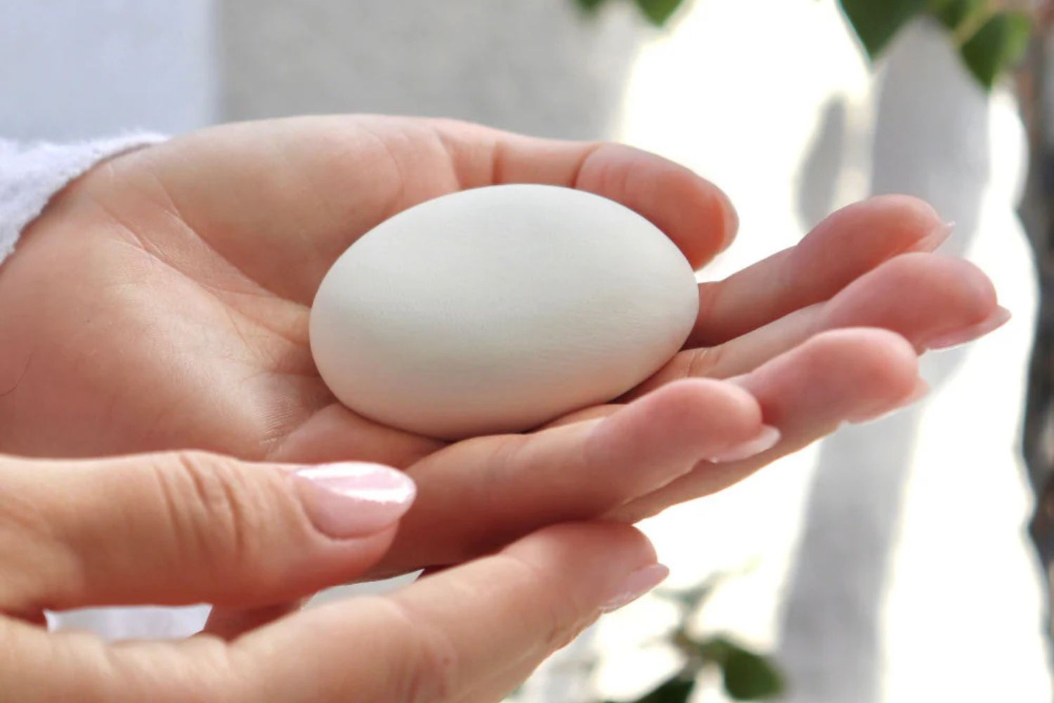 woman holding cremation stone