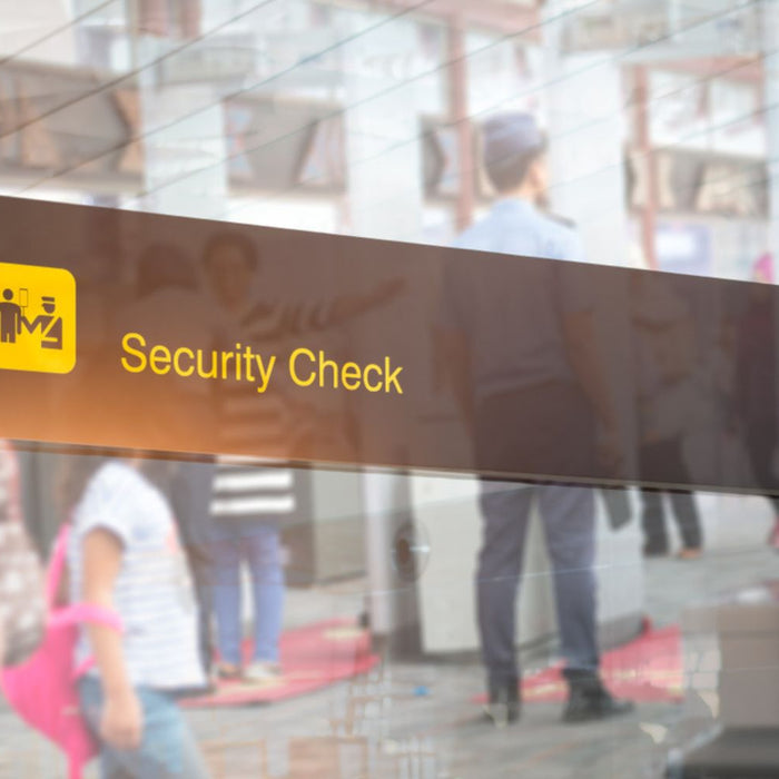 security check airport sign